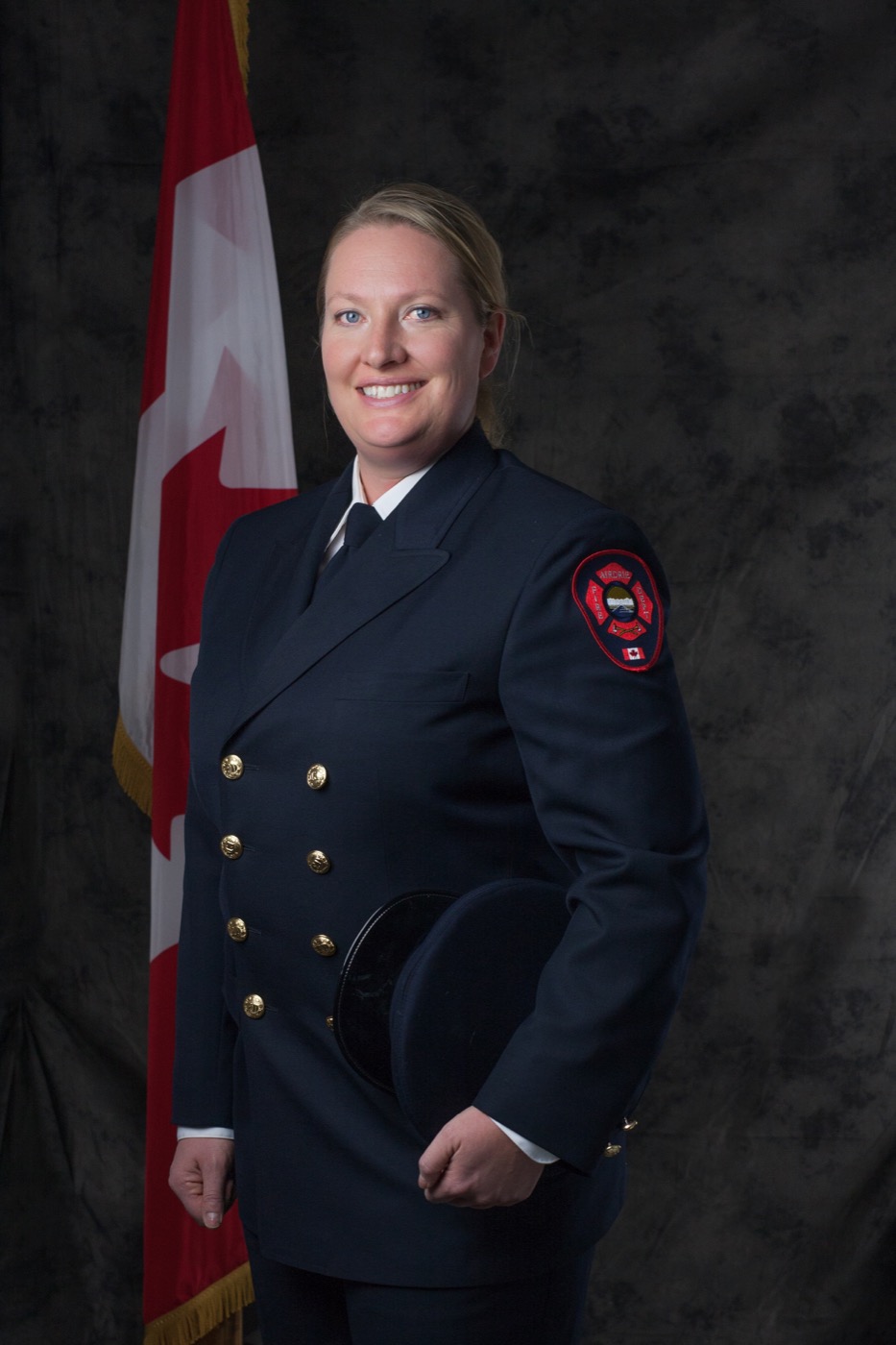 Angela Van Ameyde in Airdrie Fire Department dress uniform